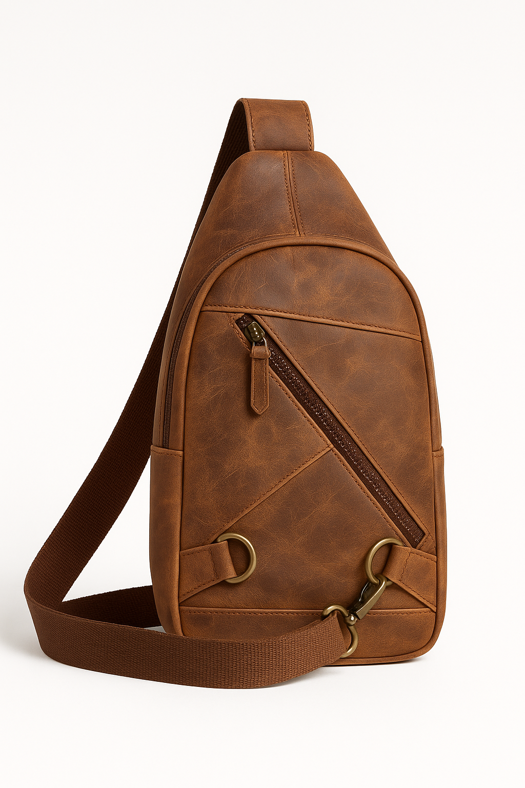 “Brown leather sling bag photographed on dark background showing back panel and strap”